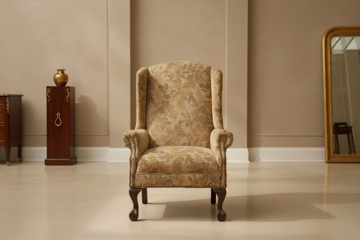 Decorative armchair in a room with furniture and items in the background
